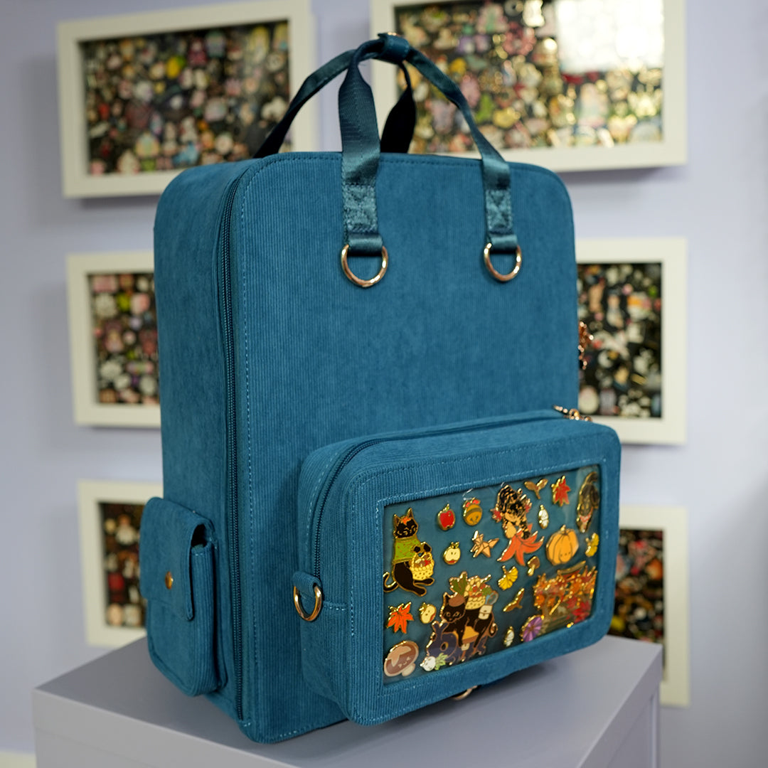 katzenjammerpins-ita-bag-rucksack-petrol-fronttasche-gold image 3