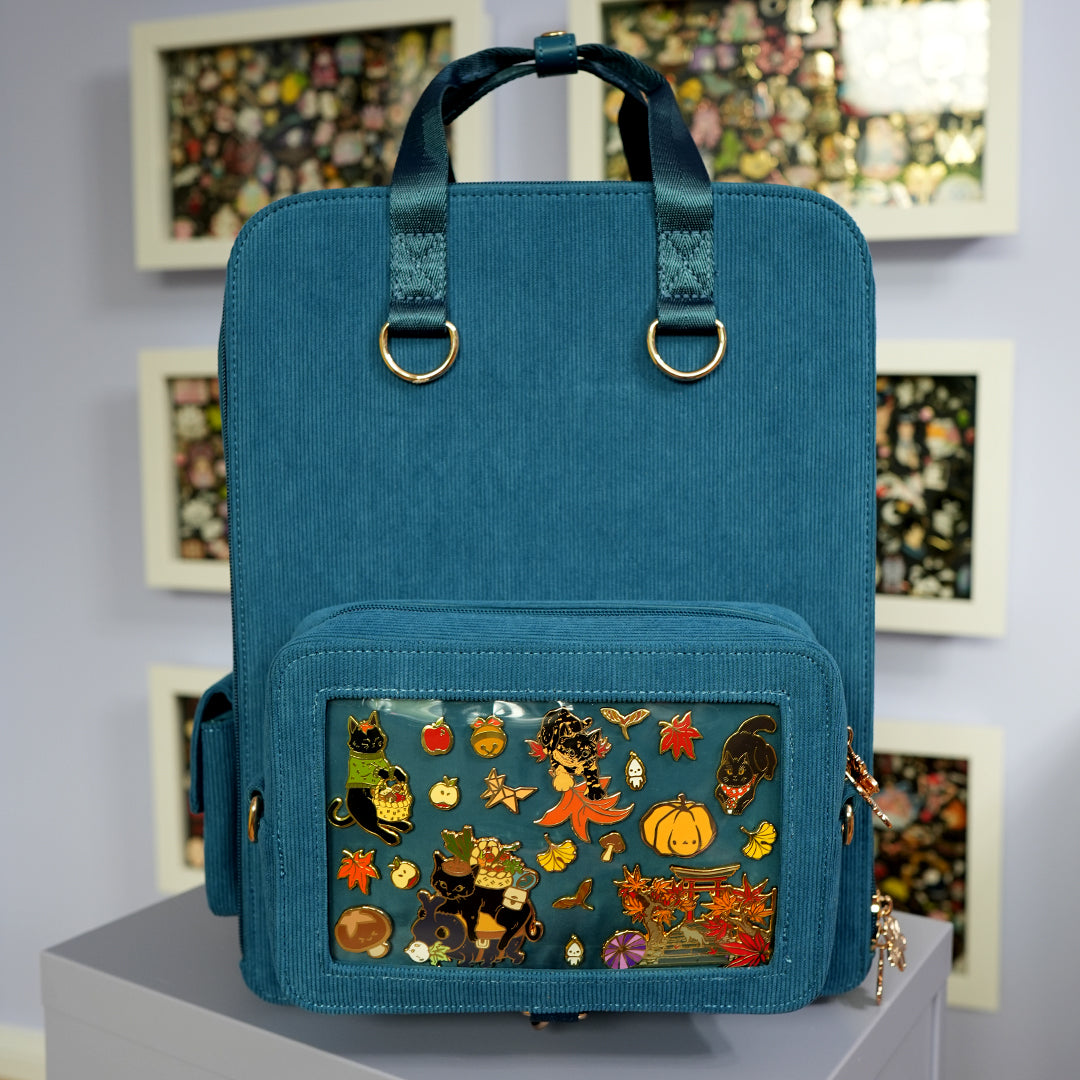 katzenjammerpins-ita-bag-rucksack-petrol-fronttasche-silber image 1