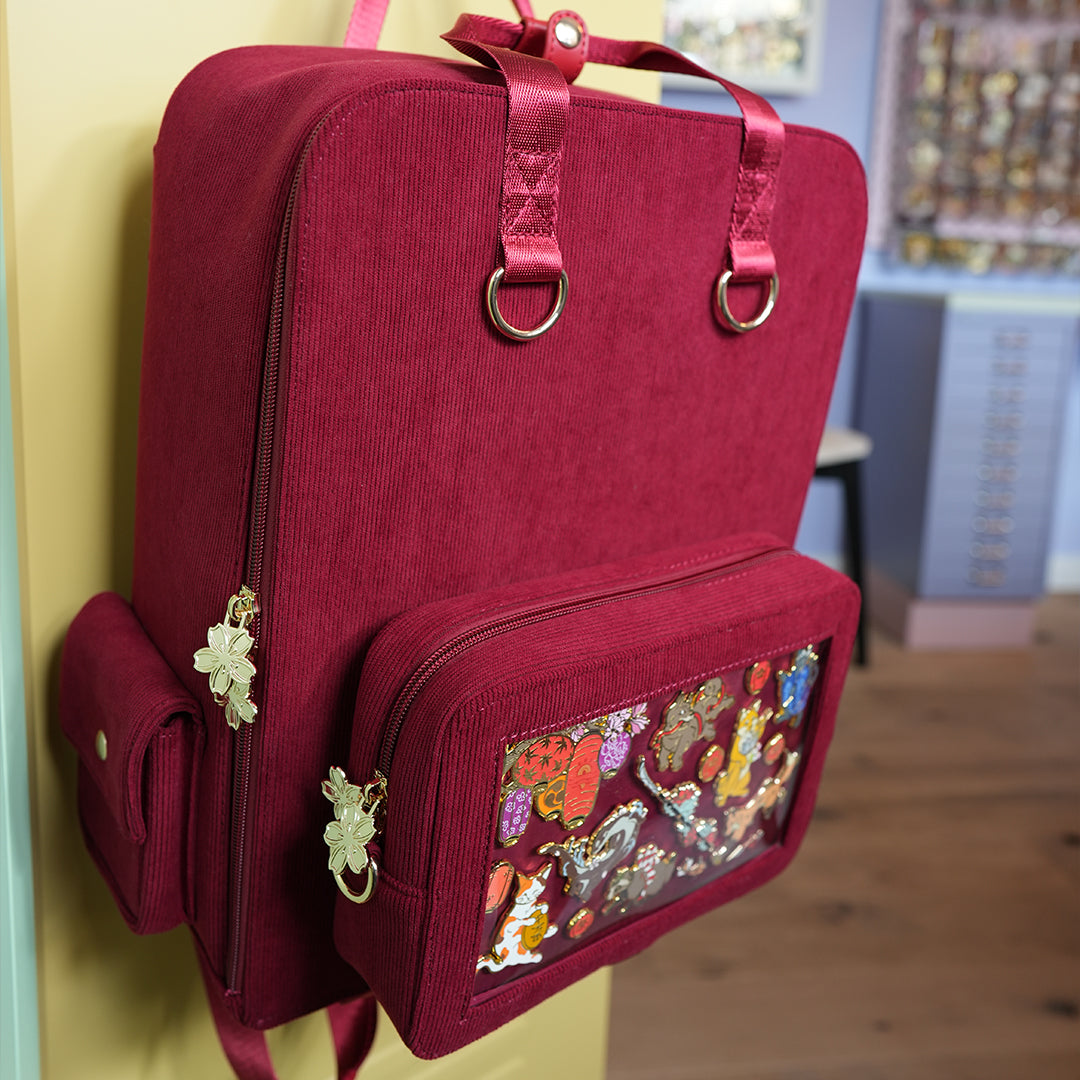katzenjammerpins-ita-bag-rucksack-rot-gold-hardware-fenster image 5