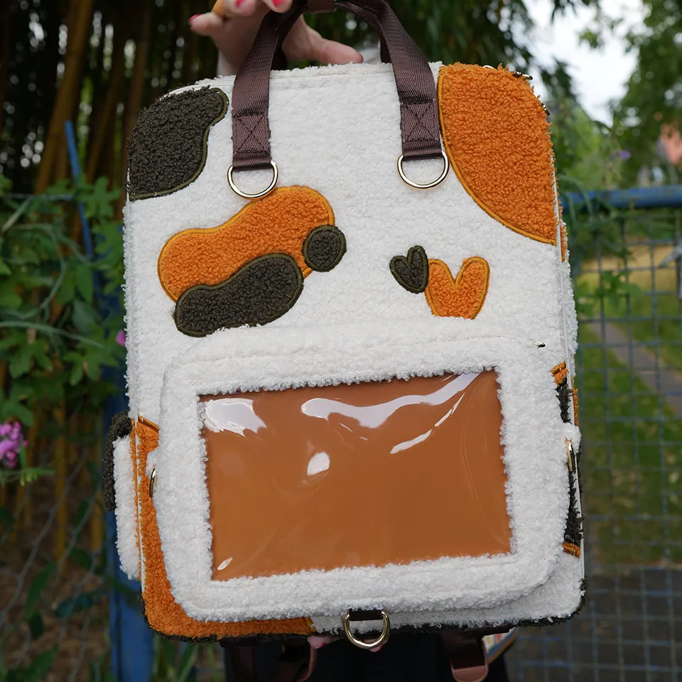 katzenjammerpins-ita-bag-rucksack-calico-front-pocket-wei image 1