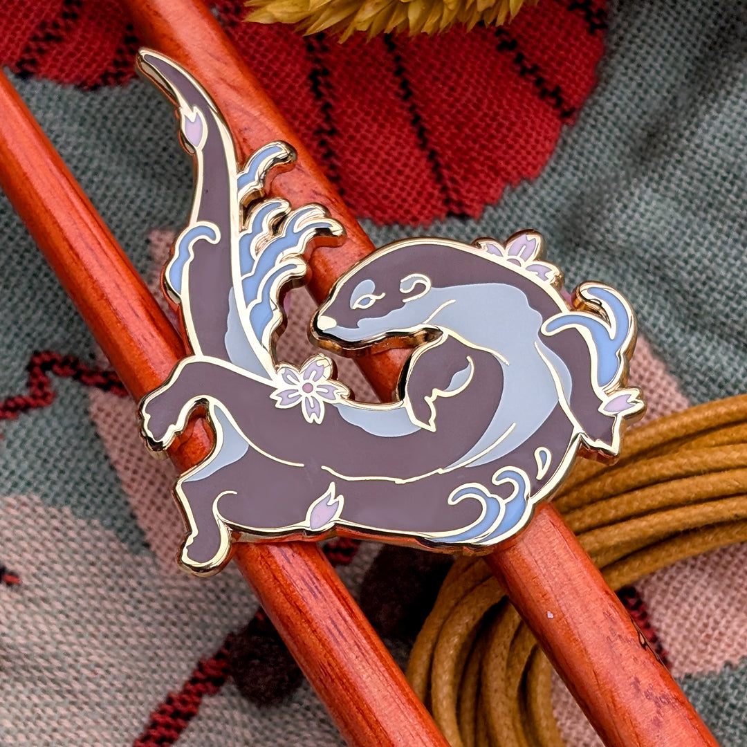 katzenjammerpins-hanami-otter-hard-enamel-pin-gold image 1