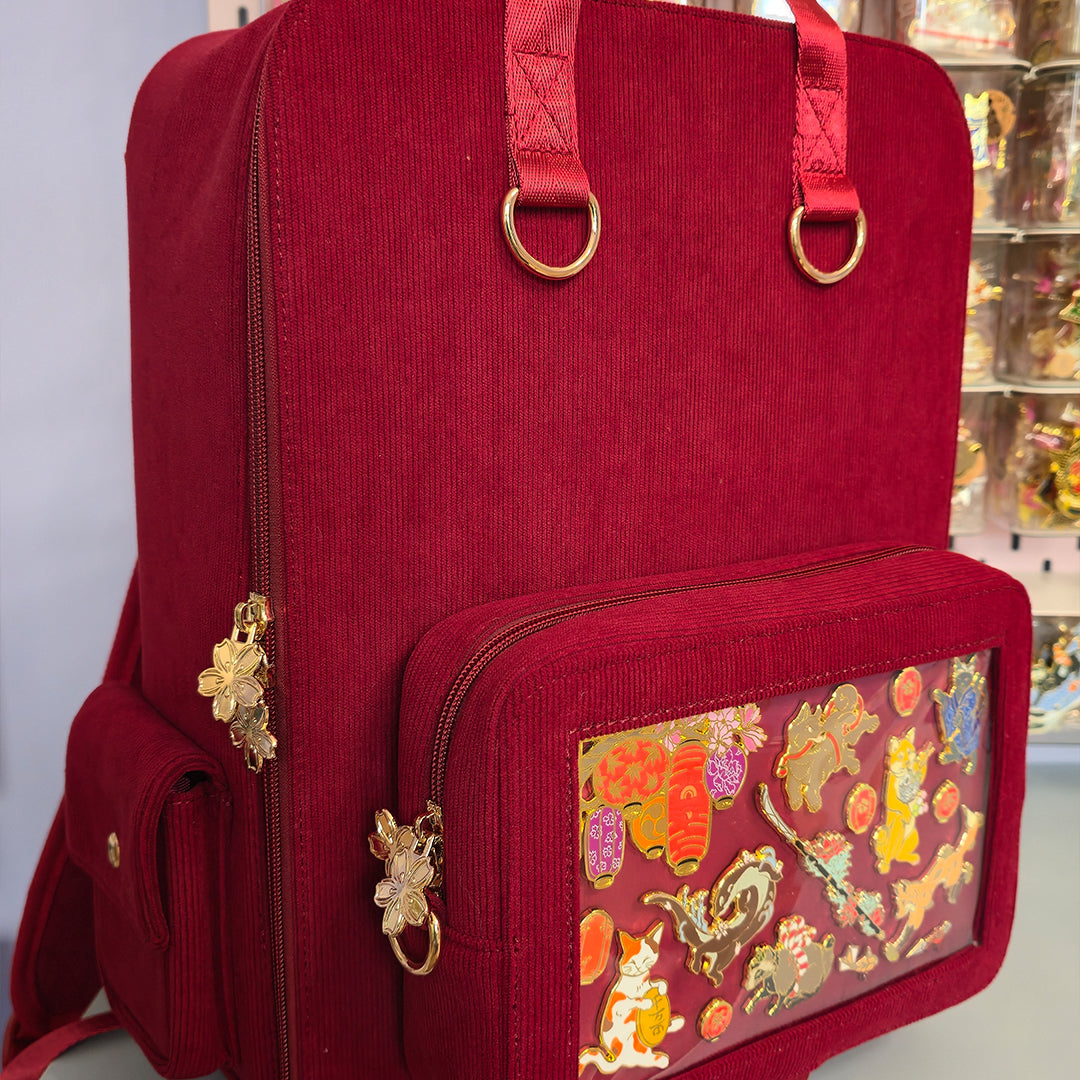katzenjammerpins-ita-bag-rucksack-rot-gold-hardware-fenster image 3