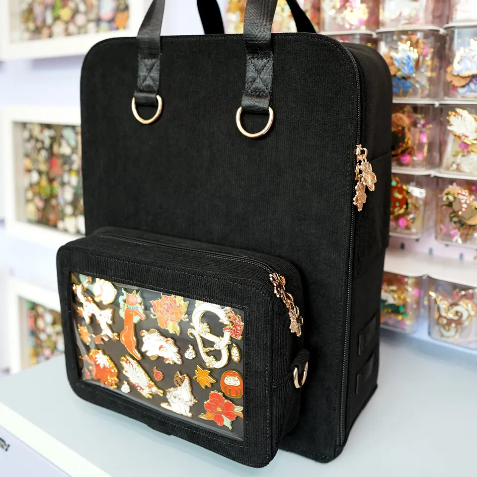 katzenjammerpins-ita-bag-backpack-rucksack-schwarz-gold image 1